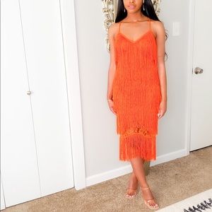 Orange fringe and lace dress